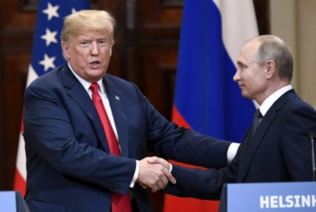 U.S. President Donald Trump and Russia's President Vladimir Putin shake hands after their joint news conference in the Presidential Palace in Helsinki, Finland on July 16, 2018.