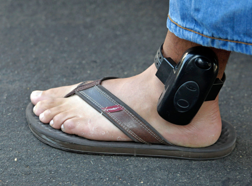 This photo shows an ankle monitor. An expert in criminal justice told Houston Matters these devices can sometimes generate false triggers.