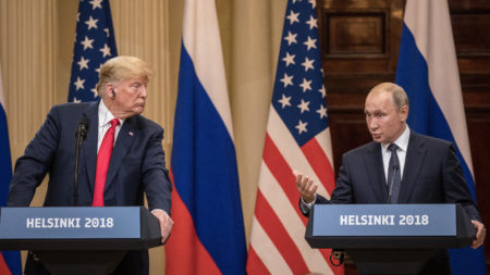President Trump and Russian President Vladimir Putin answer questions during a joint news conference after their summit on July 16 in Helsinki.