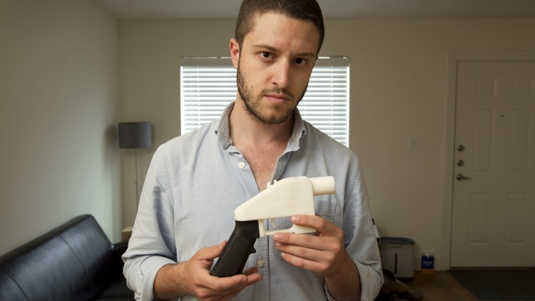 Jay Janner / AMERICAN-STATESMANIn this 2013 photo, Austinite Cody Wilson shows the first completely 3-D-printed handgun, The Liberator.