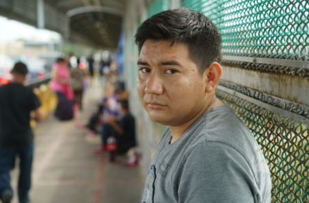 Marcos Samayoa waits on the Brownsville/Gateway International Bridge in June 2018.