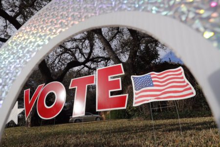 A "vote" sign in a yard in west Austin on March 6, 2018.