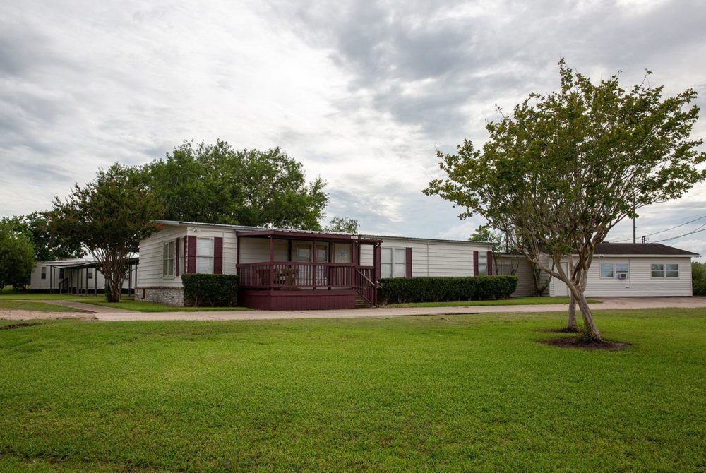 The Shiloh Treatment Center, near Manvel, is one of 32 Texas facilities licensed to care for migrant children who have been separated from their parents. The facility, where inspectors have found eight recent health and safety violations, has received $25 million in federal payments since 2013. 
