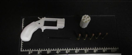 This Aug. 4, 2016, photo, provided by the Transportation Security Administration shows a plastic replica revolver TSA agents recovered from a passenger's carry-on bag at Reno-Tahoe International Airport in Reno, Nev. The man agreed to leave the prohibited, fake firearm made from a 3D printer behind and was allowed to board the plane without incident.