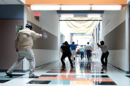School marshal trainees go through a simulation of an active shooting at an elementary school in Pflugerville last week.