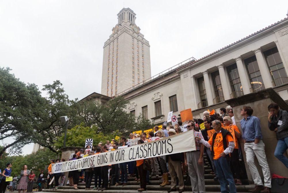 University of Texas at Austin faculty and students protest Texas' recently passed campus carry law on Nov. 10, 2015.  