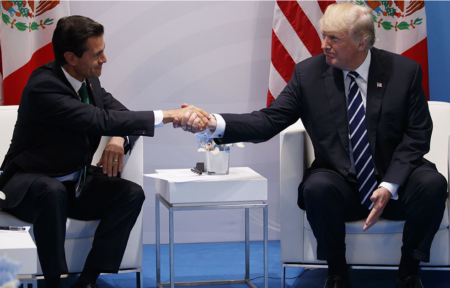 Mexican President shakes hands with Donald Trump