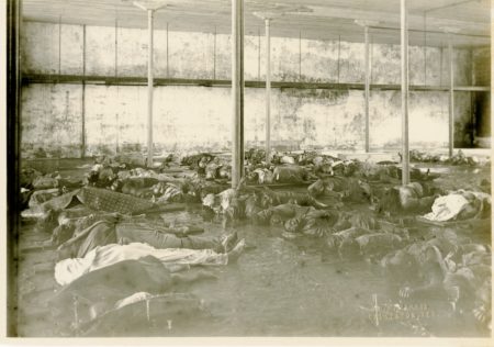 Bodies lying in makeshift morgue after 1900 Hurricane.