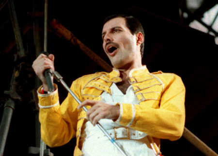 FILE - In this July 20, 1986 file photo, Queen lead singer Freddie Mercury performs, in Germany. Queen guitarist Brian May says an asteroid in Jupiter's orbit has been named after the band's late frontman Freddie Mercury on what would have been his 70th birthday, it was reported on Monday, Sept. 5, 2016. May says the International Astronomical Union's Minor Planet Centre has designated an asteroid discovered in 1991, the year of Mercury's death, as "Asteroid 17473 Freddiemercury."