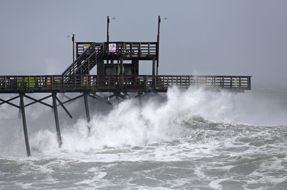 Waves from Hurricane Florence pound the Bogue Inlet Pier in Emerald Isle N.C., Thursday, Sept. 13.