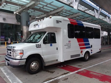 A METROLift bus makes a stop at the Downtown Transit Center.
