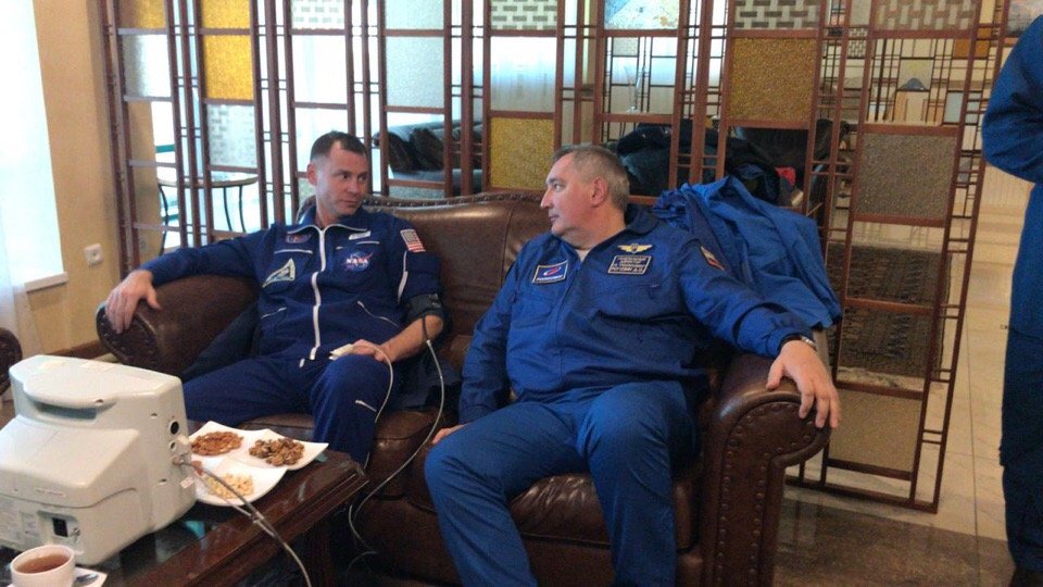 Astronaut Nick Hague (left) and Roscosmos Director Dmitry Rogozin.