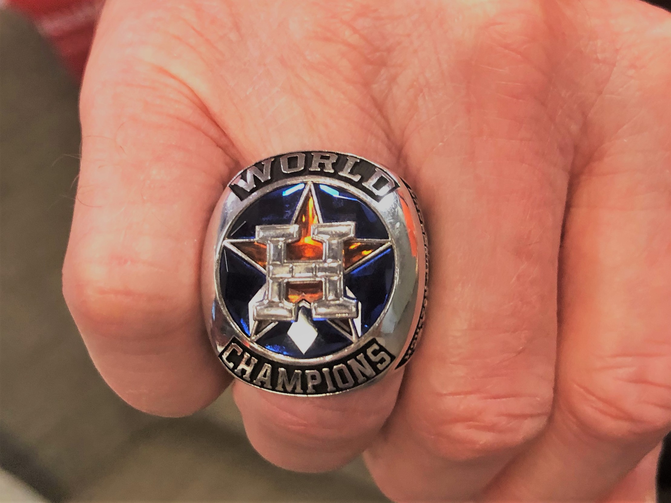 Abbott poses for pictures with Astros World Series trophy