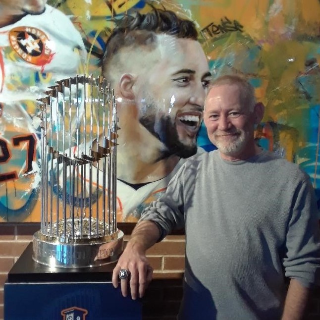 Texas Gov. Abbott poses for pictures with Astros World Series trophy