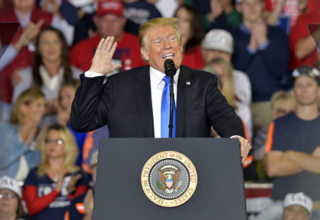 President Donald Trump speaks to a crowd at Eastern Kentucky University, Saturday, Oct. 13, 2018, in Richmond, Ky.