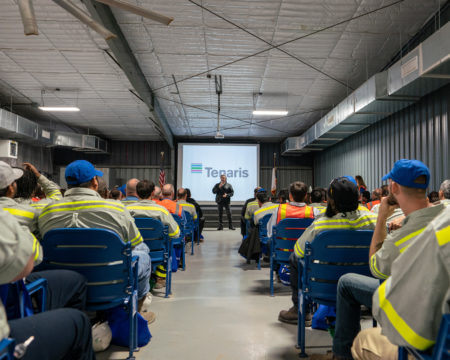 Luca Zanotti, President of Tenaris USA, speaks to workers of the company's plant in Conroe during an event held to celebrate its reopening on October 19, 2018.