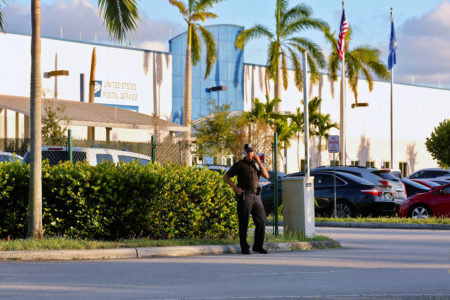 Police outside the U.S. Post Office Royal Palm Processing