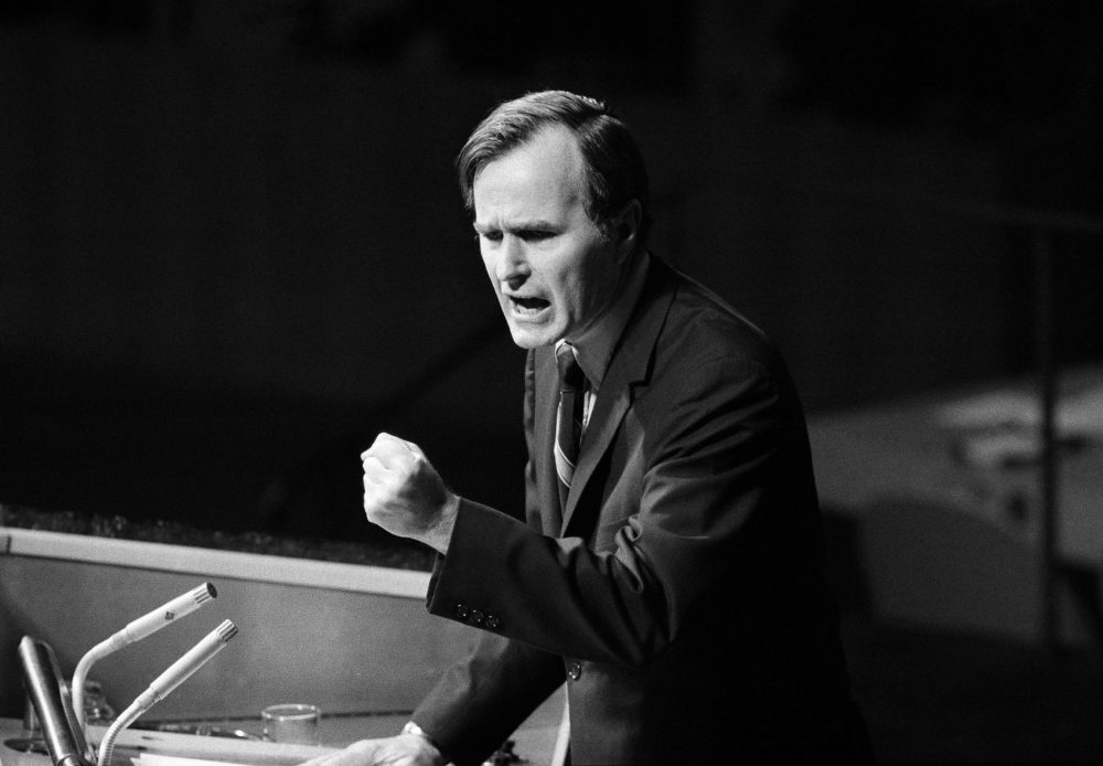 In this Oct. 18, 1971, file photo, U.S. Ambassador George H.W. Bush gestures as he addresses the United Nations General Assembly during the China debate. He denied the U.S. formula was either a "Two Chinas" or a "One China and one Taiwan" plan. 