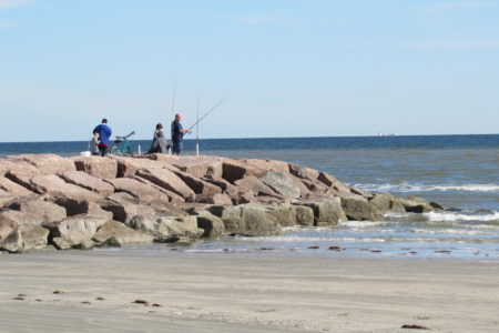 Fishermen on a Galveston Island Jetty.