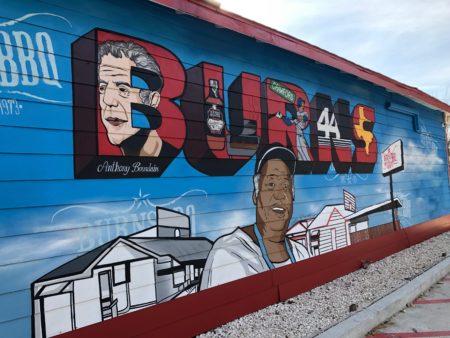 The mural traces the history of Burns BBQ, which first opened in 1973.