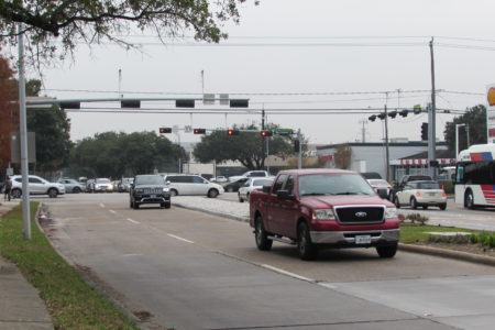 Traffic moves through the intersection at Wilcrest and Westheimer.