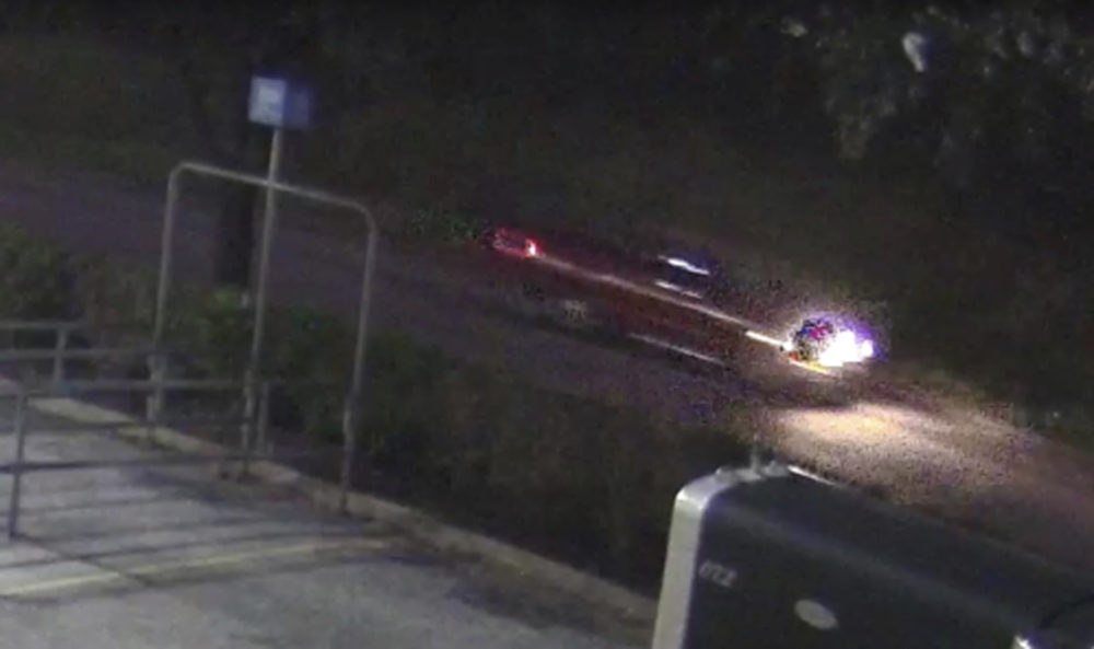 This photo provided by the Harris County Sheriff's Office shows an image taken from surveillance video of a pickup whose driver, according to authorities, fired several shots into a car carrying a family, killing a 7-year-old girl and wounding the child's mother, Sunday, Dec. 30, 2018, in the Houston area. (Courtesy of Harris County Sheriff's Office via AP)