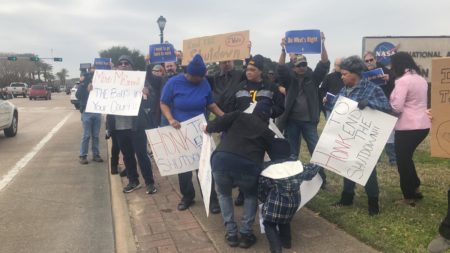 Federal workers protested the partial shutdown of the federal government on January 15, 2019, at Houston's Johnson Space Center.