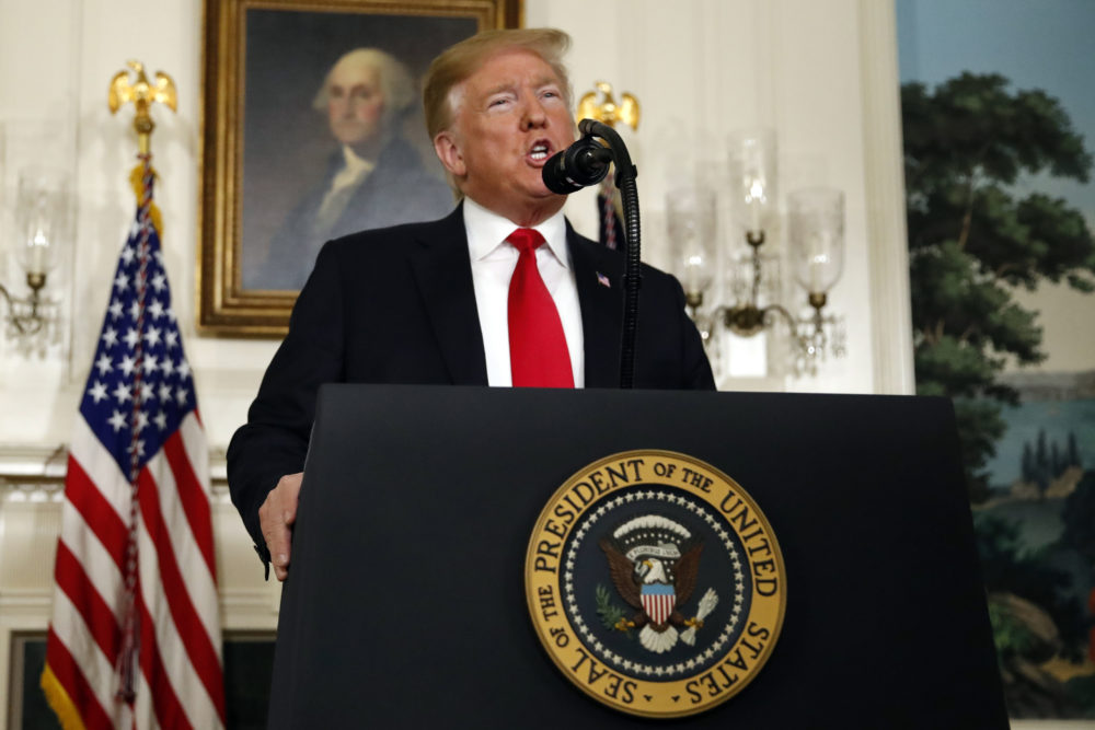President Donald Trump speaks about the partial government shutdown, immigration and border security in the Diplomatic Reception Room of the White House, in Washington, Saturday, Jan. 19, 2019. (AP Photo/Alex Brandon)