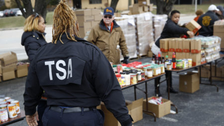 A TSA employee visits a Baltimore food pantry for government workers affected by the federal shutdown.