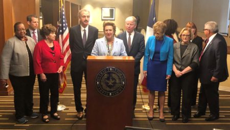 Harris County District Attorney Kim Ogg (center) attended a summit of Prosecutors Against Gun Violence in Houston and talked about her request her request for 102 additional prosecutors on Feb. 11, 2019.