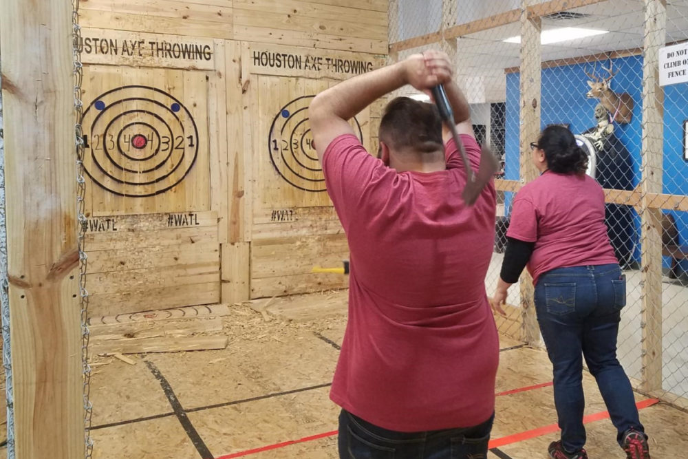People Throwing Axes