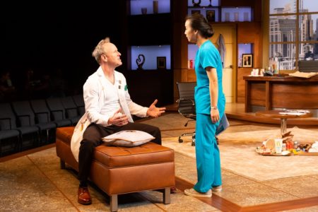 Chris Hutchison
as Dr. Irving Baer and Christina Liang, as Kelly  Henning in The Alley Theatre's 'QUACK'