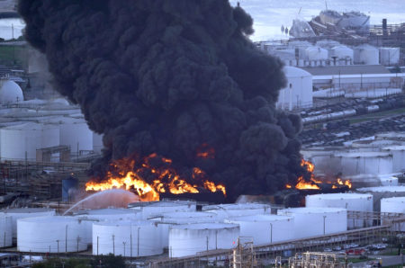 Firefighters battle a petrochemical fire at the Intercontinental Terminals Company Monday, March 18, 2019, in Deer Park, Texas. The large fire at a Houston-area petrochemicals terminal will likely burn for another two days, authorities said Monday, noting that air quality around the facility was testing within normal guidelines. (AP Photo/David J. Phillip)