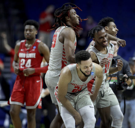 Houston players celebrate after their second round men's college basketball game against Ohio State in the NCAA Tournament Sunday, March 24, 2019, .