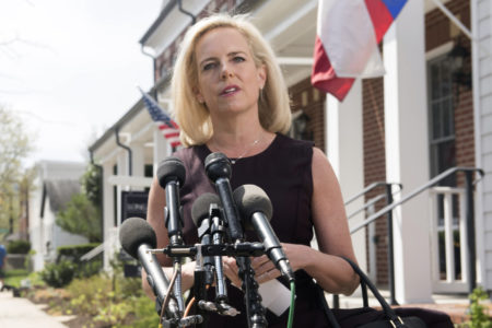 Homeland Security Secretary Kirstjen Nielsen talks outside her home in Alexandria, Va., on Thursday, April 8, 2019. Nielsen says she continues to support the president’s goal of securing the border in her first public remarks since her surprise resignation.  (AP Photo/Kevin Wolf)