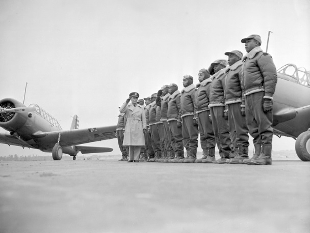 Maj. James A. Ellison returns the salute of Mac Ross as he passes down the line during review of the first class of Tuskegee cadets.