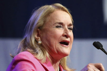 FILE - In this June 22, 2018 file photo, Texas State Senator Sylvia Garcia speaks during the general session at the Texas Democratic Convention in Fort Worth, Texas. Garcia, a Democratic Congressional candidate, faces Republican Phillip Aronoff and Libertarian Cullen Burns in the Nov. 6 election. (AP Photo/Richard W. Rodriguez)