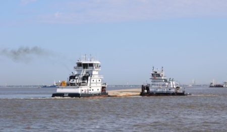 Two barges involved in a collision are removed from the Houston Ship Channel, May 15, 2019. Kirby barge 30015T was transferred to the Southwest Shipyard at Channelview, while barge MMI 3041 was transferred to Barbour’s Cut Turning Basin.
