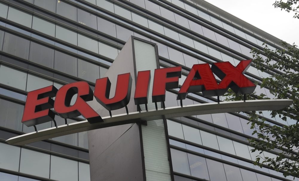This July 21, 2012, file photo shows signage at the corporate headquarters of Equifax Inc., in Atlanta. Equifax will pay up to $700 million to settle with the Federal Trade Commission and others over a 2017 data breach that exposed Social Security numbers and other private information of nearly 150 million people. The proposed settlement with the Consumer Financial Protection Bureau, if approved by the federal district court Northern District of Georgia, will provide up to $425 million in monetary relief to consumers, a $100 million civil money penalty, and other relief.