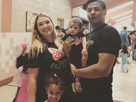 A photo shows Jordan Anchondo (left) and her husband, Andre Anchondo, with two of their children. The couple died last weekend when a gunman stormed a Walmart in El Paso, killing at least 22 people and wounding more than two dozen others.