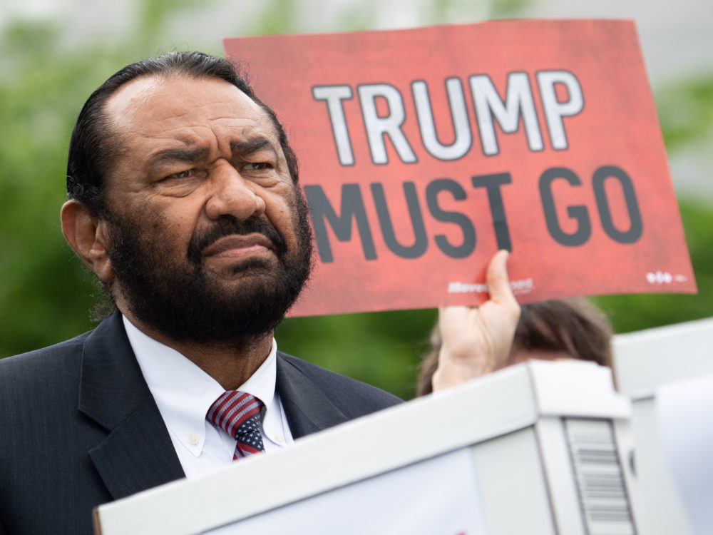 Rep. Al Green speaks during a news conference in May as activists urge Congress to begin impeachment proceedings against President Trump.