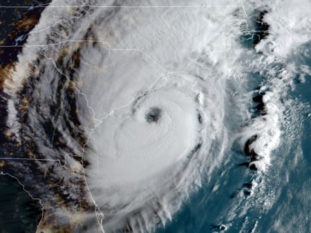 Hurricane Dorian is edging close to the southeastern coast, bringing dangerous flooding to South Carolina. The storm is seen here at 8 a.m. ET Thursday.