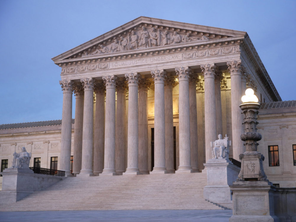 The U.S. Supreme Court building at dusk on Capitol Hill in Washington.