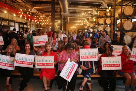 Hispanic Trump voters show their support at a voter outreach event at Gulf Coast Distillers on Thursday, Sept. 12, 2019.