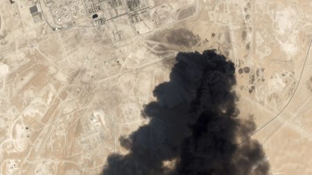 This Saturday, Sept. 14, 2019, satellite image from Planet Labs Inc., shows thick black smoke rising from Saudi Aramco's Abqaiq oil processing facility in Buqyaq, Saudi Arabia.