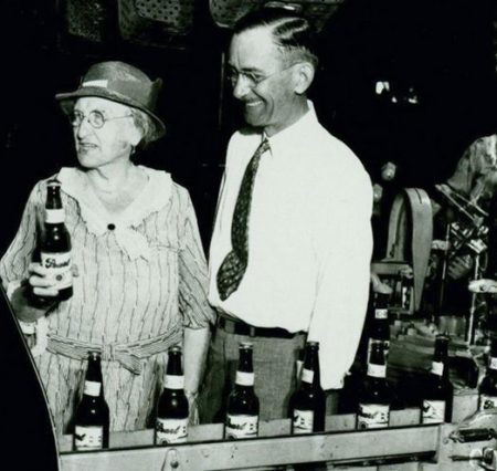 Emma Koehler and her nephew, Otto A. Koehler, on the Pearl Beer production line.
