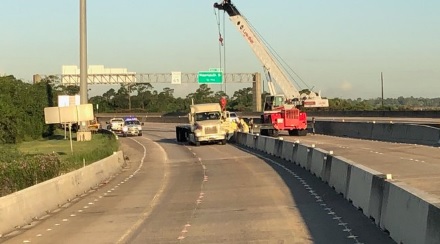 TxDOT crews working to reopen traffic on the I-10 bridge  over the San Jacinto River. Severe weather caused by Tropical Storm Imelda damaged the bridge last week.