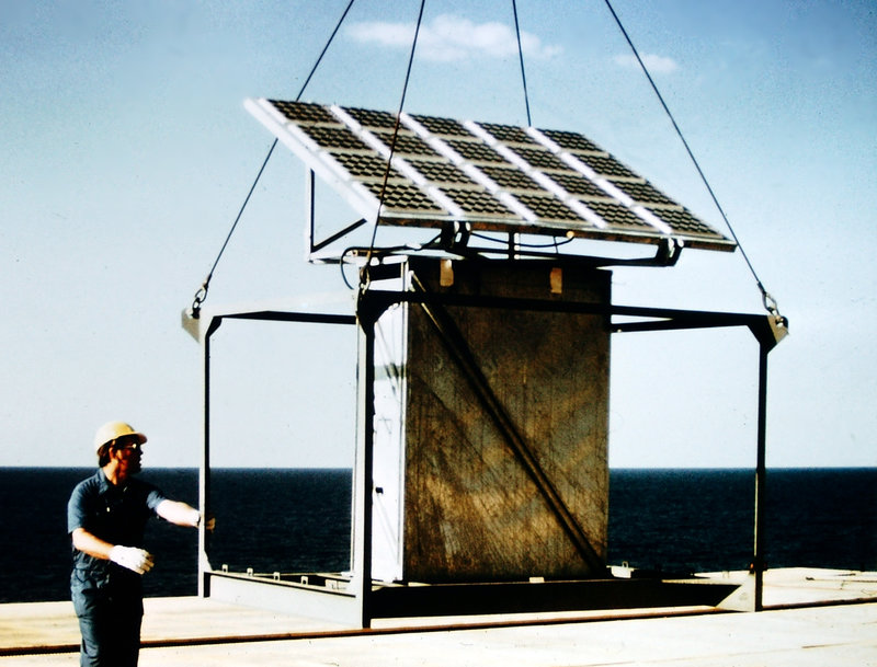 An early use for solar panels was on oil platforms, which needed power for navigation aids such as foghorns and flashing lights. Here, a Solar Power Corp. array is installed on an oil platform.