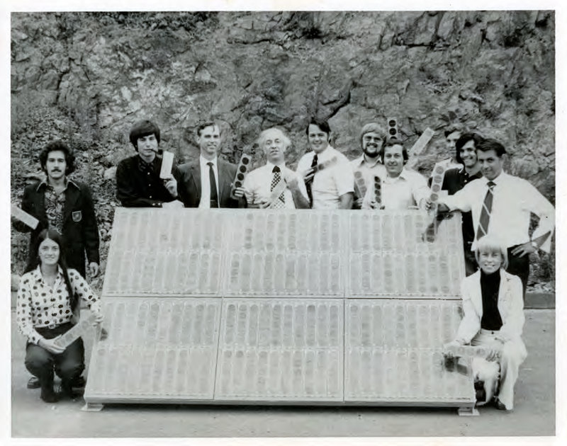 Elliot Berman (center, in patterned tie) and his team at Solar Power Corp. pose outside their office and manufacturing facility in Braintree, Mass., in 1973. John Perlin, author of Let It Shine: The 6,000-Year Story of Solar Energy, credits Berman, Solar Power Corp. and Exxon with "planting the flag of photovoltaics throughout the world."