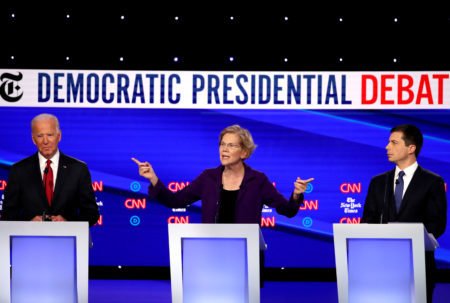 Left to right, former Vice President Joe Biden, Massuchusetts Sen. Elizabeth Warren and South Bend, Ind. Mayor Pete Buttigieg react on stage during the Democratic Presidential Debate at Otterbein University.